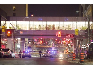 Police attend the scene of a shooting near the Rideau Centre in Ottawa on Sunday, December 23, 2018.   (Patrick Doyle)  ORG XMIT: 1224 rideau shooting 06