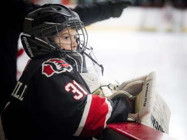 Nepean Raiders goalie #31 Cohen Underhill keeps a close eye to the game.