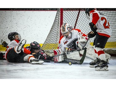 Philadelphia Little Flyers goalie Grant Gale makes a save.