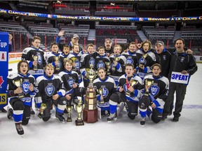 Happy Richmond Royals team members pose for a photo after winning.