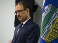Minister of Natural Resources Amarjeet Sohi stands beside an Alberta provincial flag as he takes part in a press conference where the Federal government announced $1.6 billion in support for Canada's oil and gas sector, at NAIT in Edmonton Tuesday Dec. 18, 2018.