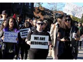 Protesters demonstrate against the demolition on Oct. 4, four days after the deadline for vacating the townhouse complex.