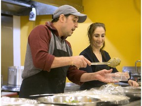 Rehab (Rita) Adas (right), who co-owns the Portuguese Bakery in Sandy Hill with her husband, decided to do more than volunteer when the first wave of Syrian refugees arrived in January, 2016. She decided that she would give them jobs.  Mohammed Al Mahasna (left), who fled his war-torn homeland with his wife and children that year, was the first chef she hired. Since then she's hired two more and the Syrian Kitchen, which is run out of the bakery, is taking off - selling their homemade recipes to many food stores around Ottawa.
