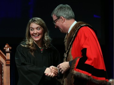 Jenna Sudds, Councillor for Ward 4 Kanata North is congratulated by Ottawa Mayor Jim Watson prior to signing the Oath of Office during the Inauguration ceremony for Ottawa's new City Council, December 03, 2018.