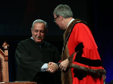 Eli El-Chantiry, Councillor for Ward 5 West Carleton-March is congratulated by Ottawa Mayor Jim Watson prior to signing the Oath of Office during the Inauguration ceremony for Ottawa's new City Council, December 03, 2018.