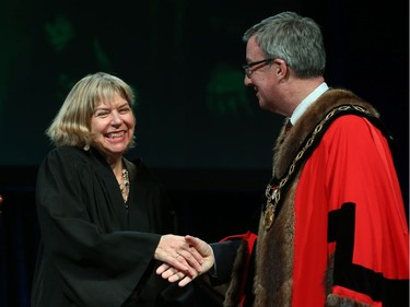 Theresa Kavanagh, Councillor for Ward 7 Bay is congratulated by Ottawa Mayor Jim Watson prior to signing the Oath of Office during the Inauguration ceremony for Ottawa's new City Council, December 03, 2018.