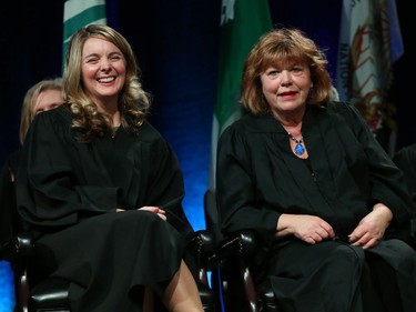 Jenna Sudds (L), Councillor for Ward 4 Kanata North and Jan Harder, Councillor for Ward 3 Barrhaven, share a chat during the Inauguration ceremony for Ottawa's new City Council, December 03, 2018.