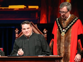 Matthew Luloff, councillor for Ward 1, Orléans, signs the Oath of Office during the Inauguration ceremony for Ottawa's new City Council, Dec. 3.