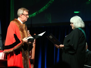 Jim Watson is sworn in as the mayor of the City of Ottawa by her Worship Louise Logue during the  inauguration ceremony for Ottawa's new City Council, December 03, 2018.