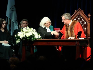 Jim Watson is sworn in as the mayor of the City of Ottawa by her Worship Louise Logue during the inauguration ceremony for Ottawa's new City Council, December 03, 2018.