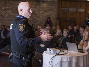 Ottawa Police Service Deputy Chief Steve Bell addresses Barrhaven residents in attendance at a community meeting at the Cedarhill Golf and Country Club. Nov. 19, 2018.