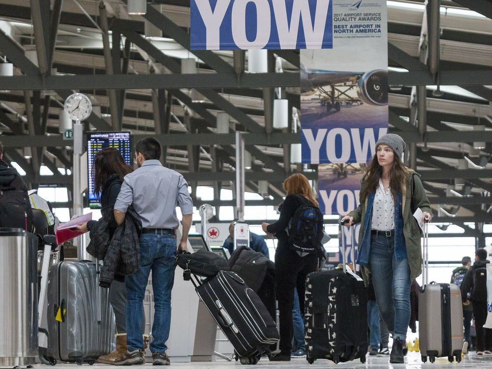 Christmas crowds pack the Ottawa International Airport Ottawa Citizen