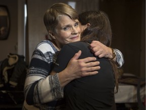 Ruth Hurst hugs her daughter Laura. Both Ruth and Laura are Sixties Scoop survivors. Ruth was scooped and adopted in 1957. She went on to have 10 children of her own who were all scooped as well. She reconnected with Laura, her second-born, last year.