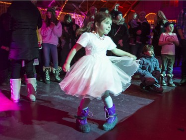 Alice Masotti, 5, dances while The County Lads perform at the seventh Annual Hogman-eh! celebration at the Aberdeen Pavilion on Monday night.