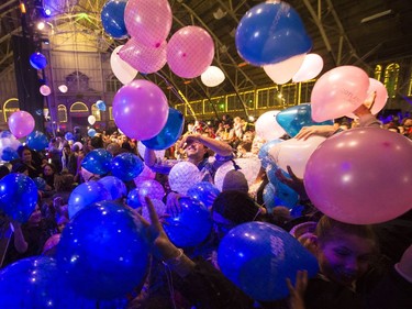 Balloons drop at the seventh annual Hogman-eh! celebration at the Aberdeen Pavilion on Monday night.