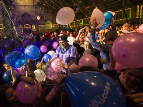 Balloons drop at the seventh annual Hogman-eh! Scottish style New Year's Eve celebration at the Aberdeen Pavilion on Monday night.