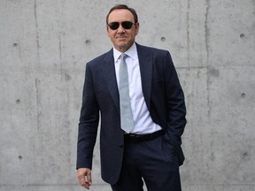 (FILES) In this file photo taken on June 21, 2016 US actor Kevin Spacey arrives at the show for fashion house Giorgio Armani during the Men's Spring - Summer 2017 fashion shows in Milan. - Oscar-winning US actor Kevin Spacey is facing a felony charge for alleged sexual assault of a teenager in a bar in 2016, US media reported on December 24, 2018.