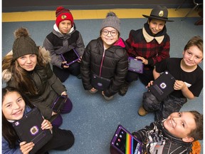 Kanatines Macey Squire, 11, Katsistanoron Jorja Jacobs, 11, Teiokwirathe Zade Mitchell, 11, Kakwirawaks Toni Lafrance, 11, Tekaronhianekon Ethan Jacobs, 11, Tsiohahiio Jacorey Thompson-Arquette, 11, and Atatshataha Jacobs, 11, are taking part in a unique safety project at Akwesasne in which a group of grade six students are trained to use iPads and how to use them to map the unsafe spots in their community.