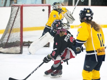 Jordan Mulvihill of the Nepean Wildcats in the Girls Atom AA division scores a goal against the Whitby Wolves as the annual Bell Capital Cup hockey tournament for Peewee and Atom level players gets underway at the Bell Sensplex and various arenas across the city.