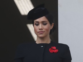 In this Nov. 11, 2018 file photo, Meghan Markle, Duchess of Sussex, attends the Remembrance Sunday ceremony at the Cenotaph in London. Meghan Markle's father appealed to his daughter to call him, saying on Monday, Dec. 17, 2018, that they hadn't been in touch since her wedding to Prince Harry in May.