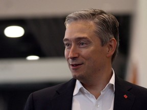 Minister of Infrastructure and Communities Francois Philippe Champagne arrives to speak to media at the Vancouver Island Conference Centre during day two of the Liberal cabinet retreat in Nanaimo, B.C., on Wednesday, August 22, 2018. Champagne says an overhaul of how the government approves funding for projects should solve concerns about construction delays and escalating costs.THE CANADIAN PRESS/Chad Hipolito