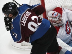 Colorado Avalanche left wing Gabriel Landeskog, front, reacts after scoring the go-ahead goal past Montreal Canadiens goaltender Carey Price in the third period of an NHL hockey game Wednesday, Dec. 19, 2018, in Denver. The Avalanche won 2-1.