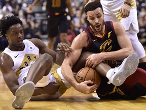 Toronto Raptors forward OG Anunoby (3) battles for the ball against Cleveland Cavaliers forward Larry Nance Jr. (22)during first half NBA basketball action in Toronto on Friday, Dec. 21, 2018.