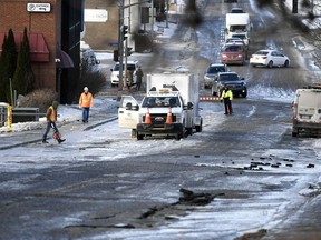 Boulevard Alexandre-Taché is closed from Rue Belleau, near the Université du Québec en Outaouais after a water main burst in Gatineau on Tuesday, December 18, 2018.