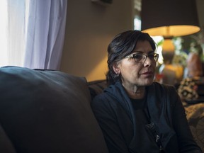 Deb Ironbow, who was coerced into having her fallopian tubes tied during a C-section in 1995, sits for a photograph in her home in Saskatoon, Saturday, December 15, 2018.