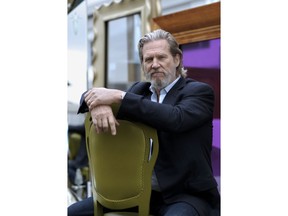 FILE - In this Nov. 19, 2010 file photo, actor Jeff Bridges poses for a portrait in Los Angeles. The Hollywood Foreign Press Association announced Monday that Bridges will be honored with the Cecil B. DeMille Award during the 76th annual awards ceremony on Jan. 6, 2019.