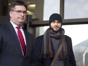 Omar Khadr appears at the courthouse in Edmonton with his lawyer in hopes of getting a Canadian Passport to travel to Saudi Arabia and permission to speak with his sister in Edmonton, December 13, 2018. Greg Southam/Postmedia