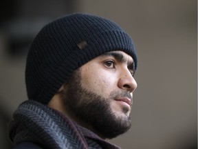 Omar Khadr appears at the courthouse in Edmonton with his lawyer in hopes of getting a Canadian Passport to travel to Saudi Arabia and permission to speak with his sister in Edmonton, December 13, 2018.