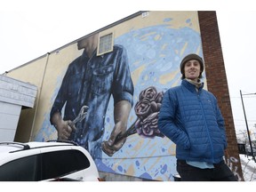 Ryan Smeeton poses by his mural at 1089 Somerset St. in Ottawa Thursday Dec 13, 2018.  Tony Caldwell