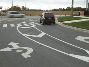 A roundabout in London, Ont. shows drivers which lanes to take.