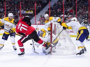 Ottawa Senators centre Chris Tierney attempts to score on Nashville Predators goaltender Juuse Saros last night. THE CANADIAN PRESS