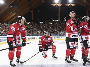 Players of Team Canada react after loosing the Spengler Cup 2018 ice hockey final match between Team Canada and KalPa Kuopio Hockey Oy in Davos, Switzerland, Monday, Dec. 31, 2018.