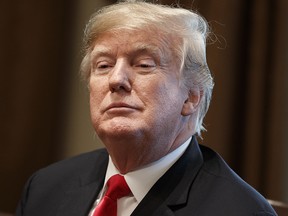 President Donald Trump listens during a meeting with newly elected governors in the Cabinet Room of the White House, Thursday, Dec. 13, 2018, in Washington. (AP Photo/Evan Vucci)