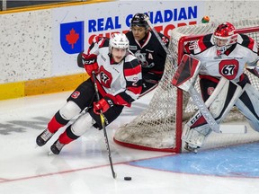 The Ottawa 67's Noel Hoefenmayer breaks out from behind his own net against the Niagara Ice Dogs on Friday, Dec. 28, 2018 at the TD Place arena.