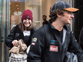 People enter a cannabis store to purchase marijuana products for the first time Oct. 17 in Montreal. The City of Ottawa is now considering whether to approve storefronts for next April.