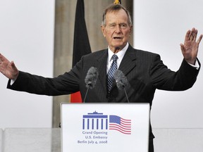 (FILES) In this file photo taken on July 04, 2008 Former US president George Bush addresses guests during a ceremony to inaugurate the new US embassy building in Berlin. - George H.W. Bush -- the upper-crust war hero-turned-oilman and diplomat who steered America through the end of the Cold War as president and led a political dynasty that saw his son win the White House -- died Friday. He was 94.