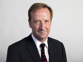 A file photo taken on Oct. 03, 2014 shows Alex Younger, successor to Sir John Sawers as chief of the Secret Intelligence Service (MI6).