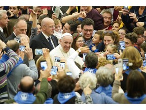 Pope Francis arrives for an audience for members of the dioceses of Molfetta and Ugento-Santa Maria di Leuca, at the Vatican, Saturday, Dec. 1, 2018.