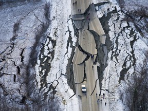 This aerial photo shows damage on Vine Road, south of Wasilla, Alaska, after earthquakes Friday, Nov. 30, 2018. Back-to-back earthquakes measuring 7.0 and 5.7 shattered highways and rocked buildings Friday in Anchorage and the surrounding area, sending people running into the streets and briefly triggering a tsunami warning for islands and coastal areas south of the city.