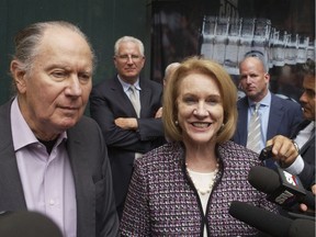 In this Oct. 2, 2018, file photo, Seattle Hockey Partners David Bonderman, left, and Seattle Mayor Jenny Durkan talk to the media as they leave a meeting at National Hockey League headquarters, in New York. The NHL Board of Governors is expected to vote to approve Seattle expansion at their two-day meeting and will get updates on collective bargaining talks and the concussion lawsuit settlement.