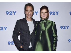 Actors Eric McCormack, left, and Debra Messing pose together backstage before their talk at the 92nd Street Y in New York on October 1, 2018. An upcoming "Will & Grace" episode will delve into the issue of gay men being restricted from donating blood. Toronto-born star Eric McCormack, who plays gay lawyer Will Truman on the sitcom, says the episode will likely air in a few months on Global and NBC.