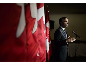 Finance Minister Bill Morneau speaks to reporters in Ottawa on November 22, 2018.