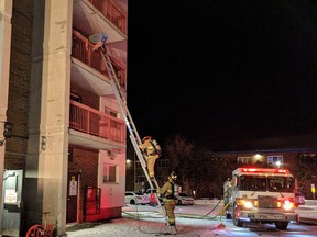 Fireifghters at 251 Donald St. Wednesday, Dec. 12