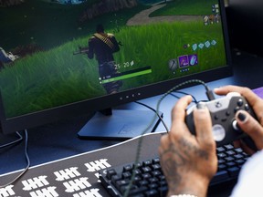 A player competes in the Epic Games Inc. Fortnite: Battle Royale Celebrity Pro Am in Los Angeles on June 12, 2018.
