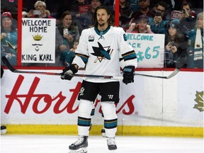 Ottawa fans show their support for the Sharks' Erik Karlsson, the former Senators captain, during the pre-game warmup on Saturday.