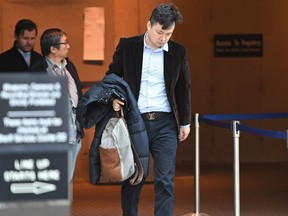 Liu Xiaozong, husband of Meng Wanzhou, Huawei's chief financial officer arrives at a B.C. courthouse following a break in the bail hearing for his wife on Monday, December 10, 2018.